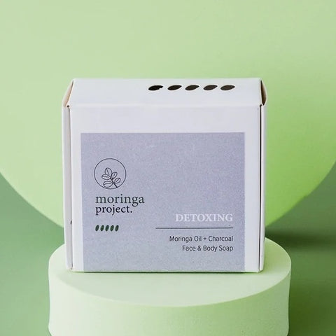 Moringa Project Detoxing Moringa Oil & Charcoal Face & Body Soap สบู่ดีท็อกซ์ สูตรน้ำมันมะรุม + ชาโคล สำหรับผิวหน้าเเละผิวกาย (100g) - Organic Pavilion
